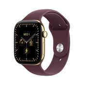 Apple Watch Series 12 (GPS + Cellular) • 46‐mm kast van Stralend Goud titanium • Bordeauxrood bandje - S/M